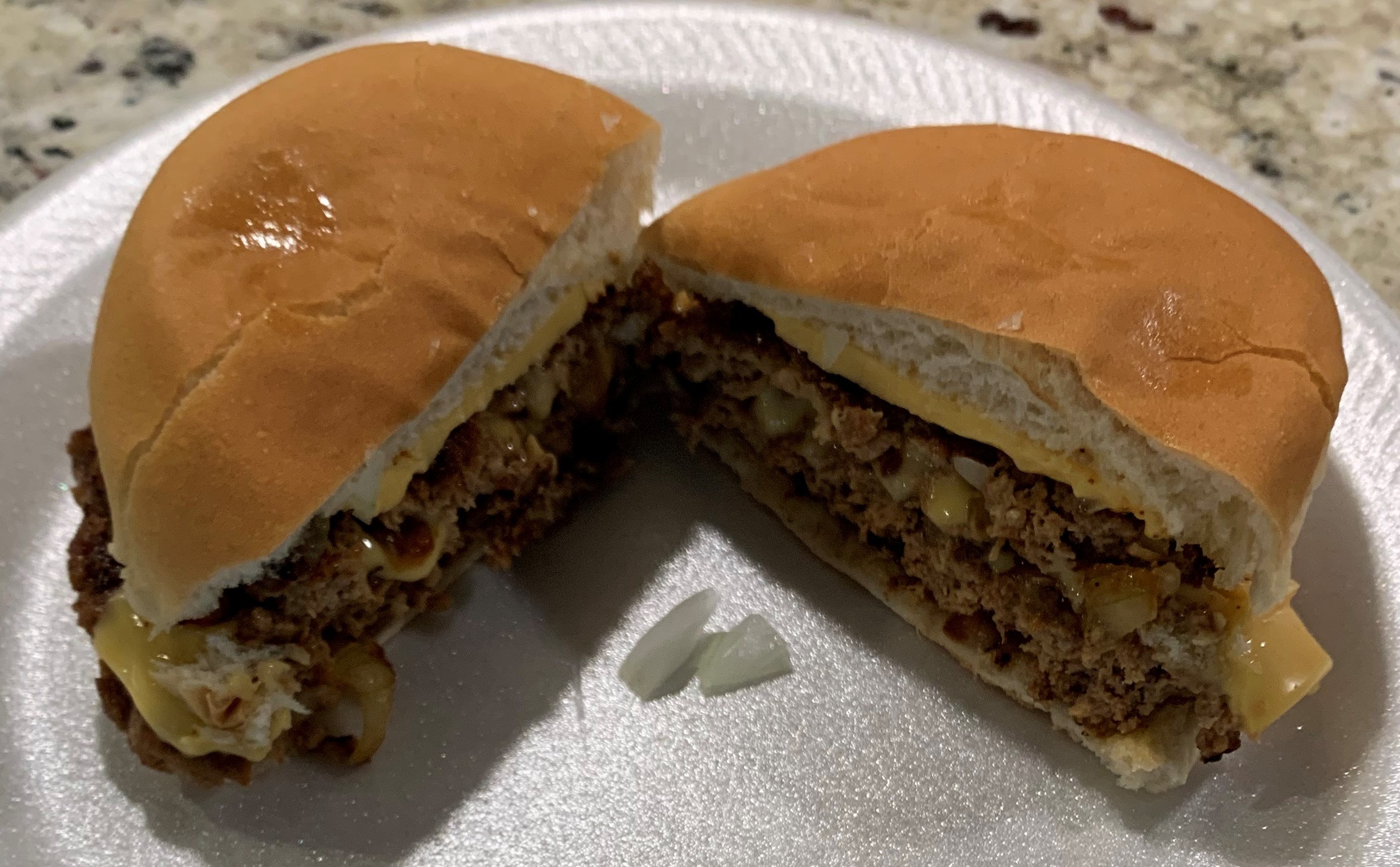 Seasoned smashed cheesy beef burger